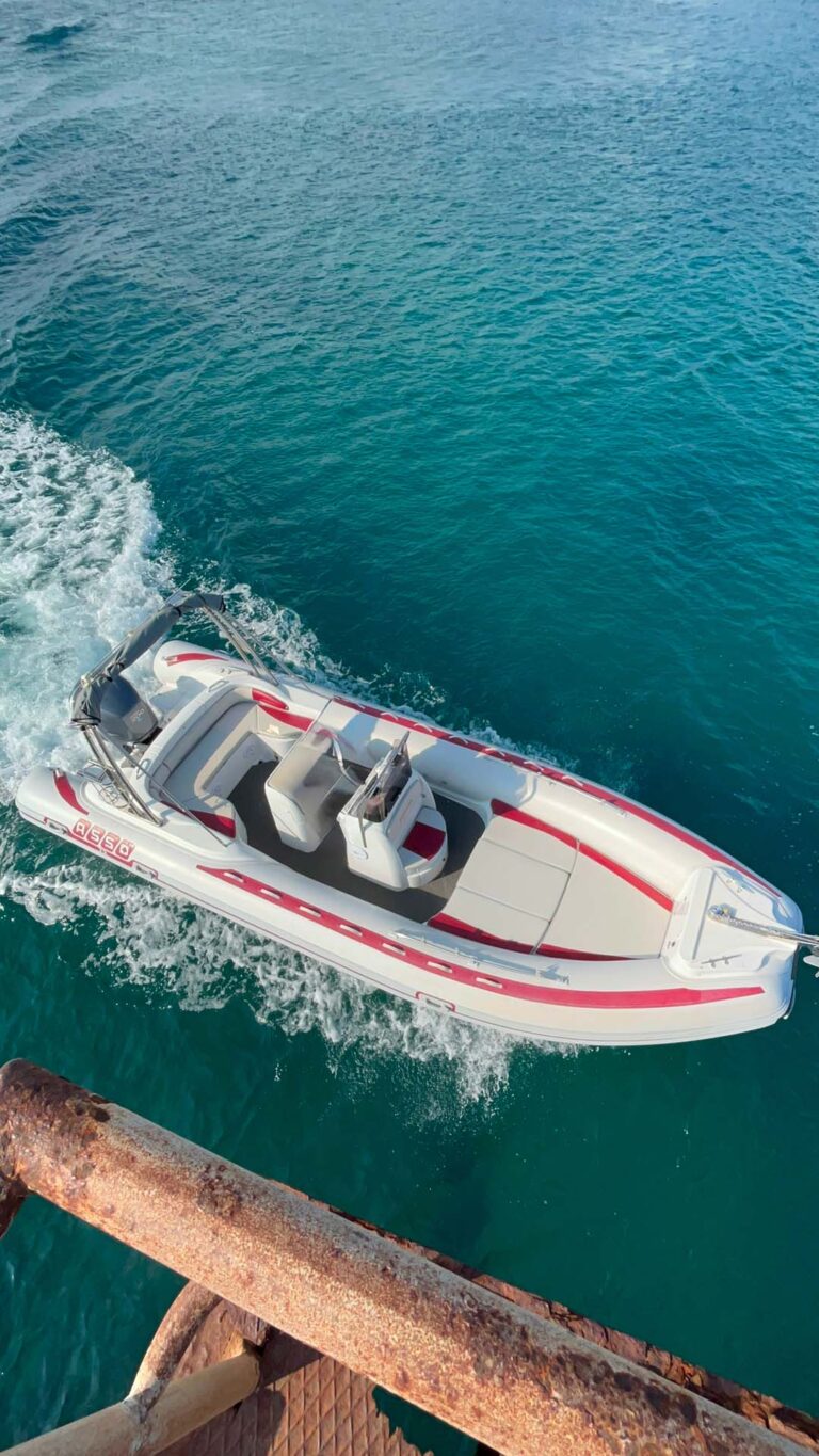 Milos Miles Car Rental picture of boat from the top